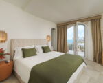 villa-maddalena-gruenes-doppelbett.jpg