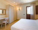 villa-magnolia-schlafbereich-mit-bett.jpg