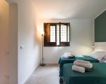 villa-mara-gruenes-schlafzimmer.jpg