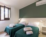 villa-mara-schlafzimmer-in-gruen.jpg