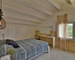 villa-nausica-schlafzimmer-mit-bett.jpg