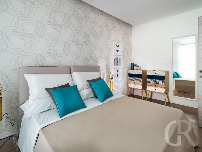 villa-palma-grosses-doppelbett-im-schlafraum.jpg