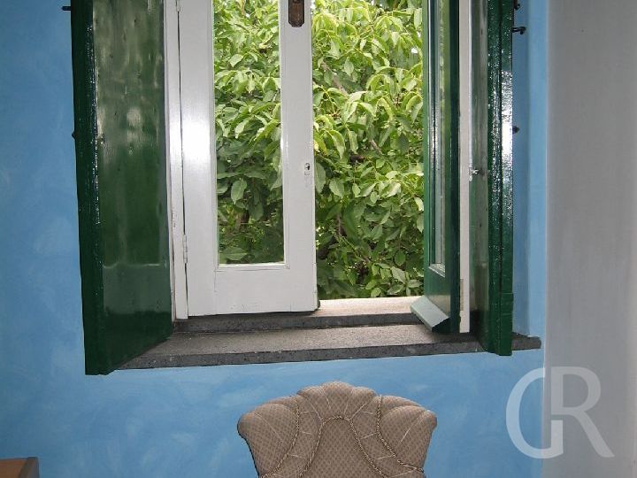 zimmer-im-pippinitto-fenster-zum-garten.jpg