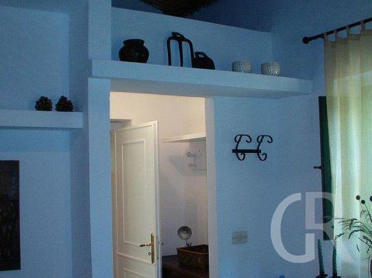 ferienhaus-gelso-durchgang-zum-schlafzimmer-und-bad.jpg