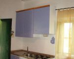 ferienhaus-gelso-kueche-mit-kleinem-esstisch.jpg