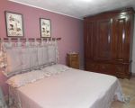 ferienwohnung-silvio-schlafzimmer-mit-grossem-kleiderschrank.JPG
