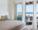 villa-fico-bett-mit-blick-ins-freie.jpg