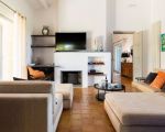 villa-pigna-blue-wohnraum-mit-kamin.jpg