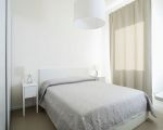 villa-rita-doppelbett-im-schlafbereich.jpg